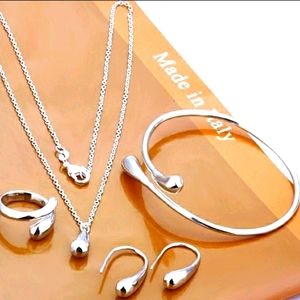 925 stamped silver Eardrop bracelet earrings.NWT